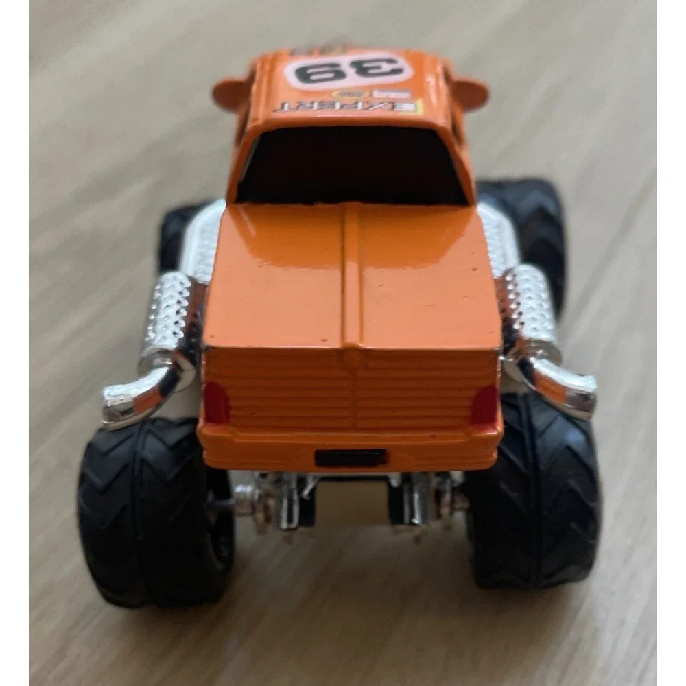 Monster Truck #39 Expert Gasoline Orange 4x4 Diecast Vehicle 1:43 4